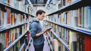 Student in library