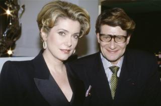 Yves Saint Laurent and Catherine Deneuve pictured at the opening of his beauty institute, in Paris