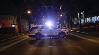 Une voiture de la police de New York stationnée sur une scène de crime à Ozone Park, dans le Queens, le13 août 2016.