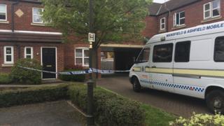 Man charged with murdering wife in Nottingham - BBC News