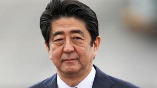Japanese Prime Minister Shinzo Abe arrives at Joint Base Pearl Harbor Hickam, Monday, Dec. 26, 2016, in Honolulu.