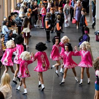 Competitors practising backstage