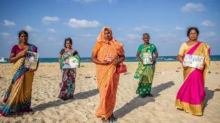 Women protesters in the beach