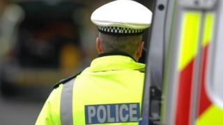 Police officer at scene of crash
