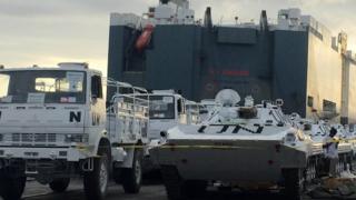 United Nations vehicles are offloaded from a Norwegian ship at the Kenyan port of Mombasa