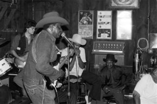 Otis 'Smokey' Smothers and his band on stage in the North Side club B.L.U.E.S, at 2519 North Halsted Street