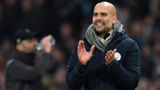 Josep Guardiola applauds