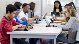 Schoolchildren using computers