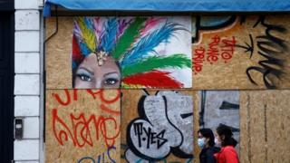 In preparation for London's Notting Hill Carnival, shops closed their windows.