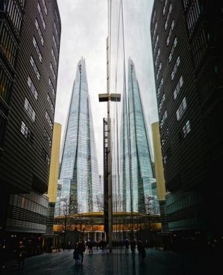 The Shard building reflected in another building