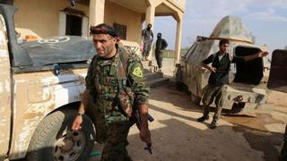 Members of YPG-dominated Syrian Democratic Forces near Manbij, in northern Syria, on 23 June 2016