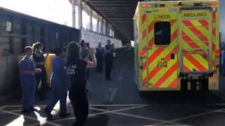 An ambulance transfers the first patients discharged from the NHS Nightingale London