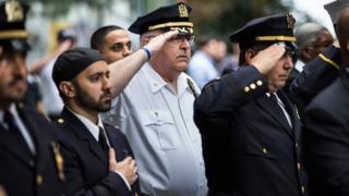 Members of law enforcement salute