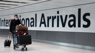 Passenger at Heathrow international arrivals