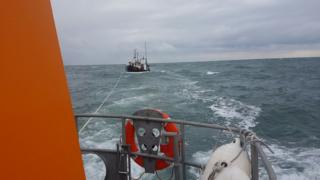 Trawler towed