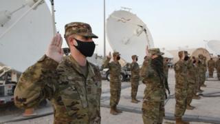 Troops take the oath in Qatar earlier this month