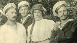 Russian sailors with young men dressed in women's clothes, 1916