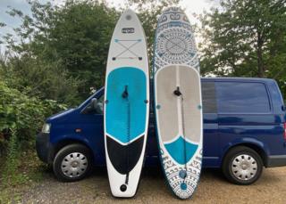 Melanie Miller's paddleboards and van