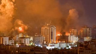 Flames and smoke billow during Israeli strikes in Gaza