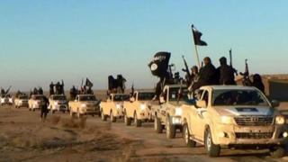 So-called Islamic State militants in Raqqa,. Syria, file