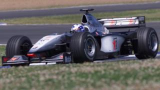 David Coulthard on his way to winning the 1999 British Grand Prix for McLaren