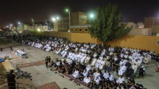 Saudi Arabian Shia worshipers gather at a hall used to commemorate Ashura in the mainly Shia coastal town of Qatif (16 October 2015)