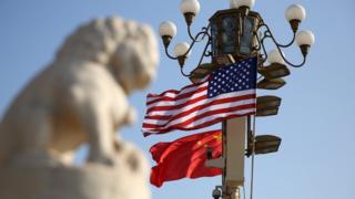 Chinese and American national flags fly on Tian'anmen Square to welcome U.S. President Donald Trump on November 8, 2017 in Beijing, China