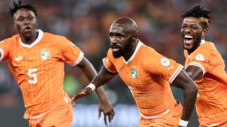 Seko Fofana (centre) celebrates his goal for Ivory Coast against Guinea-Bissau