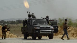 A truck firing a machinegun