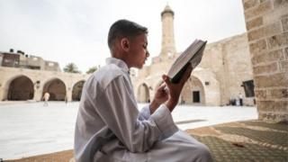 Boy reciting the Quran