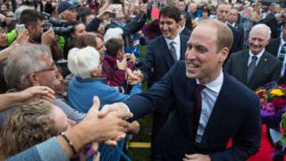 Prince William and Justin Trudeau greeting crowds at the Legislative Assembly of British Columbia