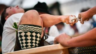 Competitors face off in the German Finger Wrestling (Fingerhakeln) Championships in Garmisch-Partenkirchen, southern Germany, 15 August 2019