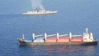 The INS Mumbai and a hijacked ship in the Gulf of Aden - 9 April 2017