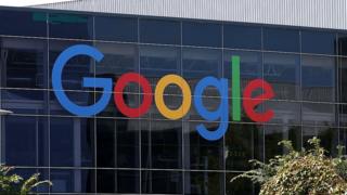 Google logo on top building