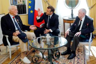 Mr Macron with French veterans Jacques Lewis and Leon Gautier