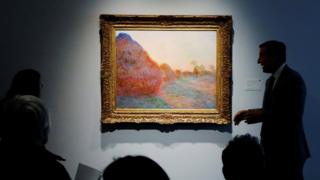 A painting by Claude Monet - one of his Haystacks series - on display in New York ahead of its auction