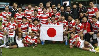Japan celebrate victory