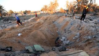 Crater after air strike near Sabratha, Libya, 19 February