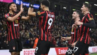 Bournemouth players celebrate Lloyd Kelly's opener against Swansea City