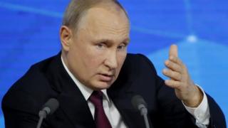 Russian President Vladimir Putin speaks during annual news conference in Moscow, Russia