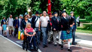 Families march to raise support