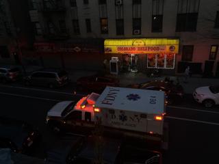 Ambulance outside Ana's apartment