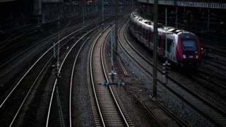 A local train leaves the Pont Cardinet railway station during a transport strike on 30 December 2019