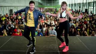 Beto Perez dancing at a Zumba event in Spain