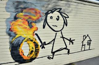 Banksy muurschildering op een school in Bristol