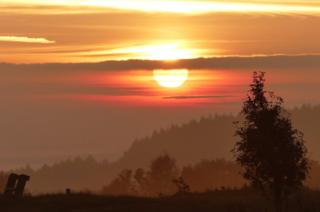 Sunrise over land