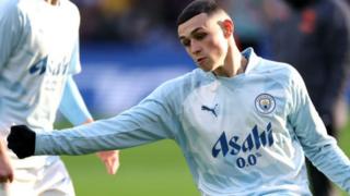 Manchester City's Phil Foden warming up