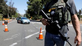 A San Diego County Sheriff's Deputy secures the scene of a shooting incident at the Congregation Chabad synagogue in Poway, north of San Diego, California, U.S. April 27, 2019