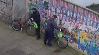 CCTV images of two men