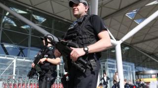 Armed police officers at London Stansted Airport